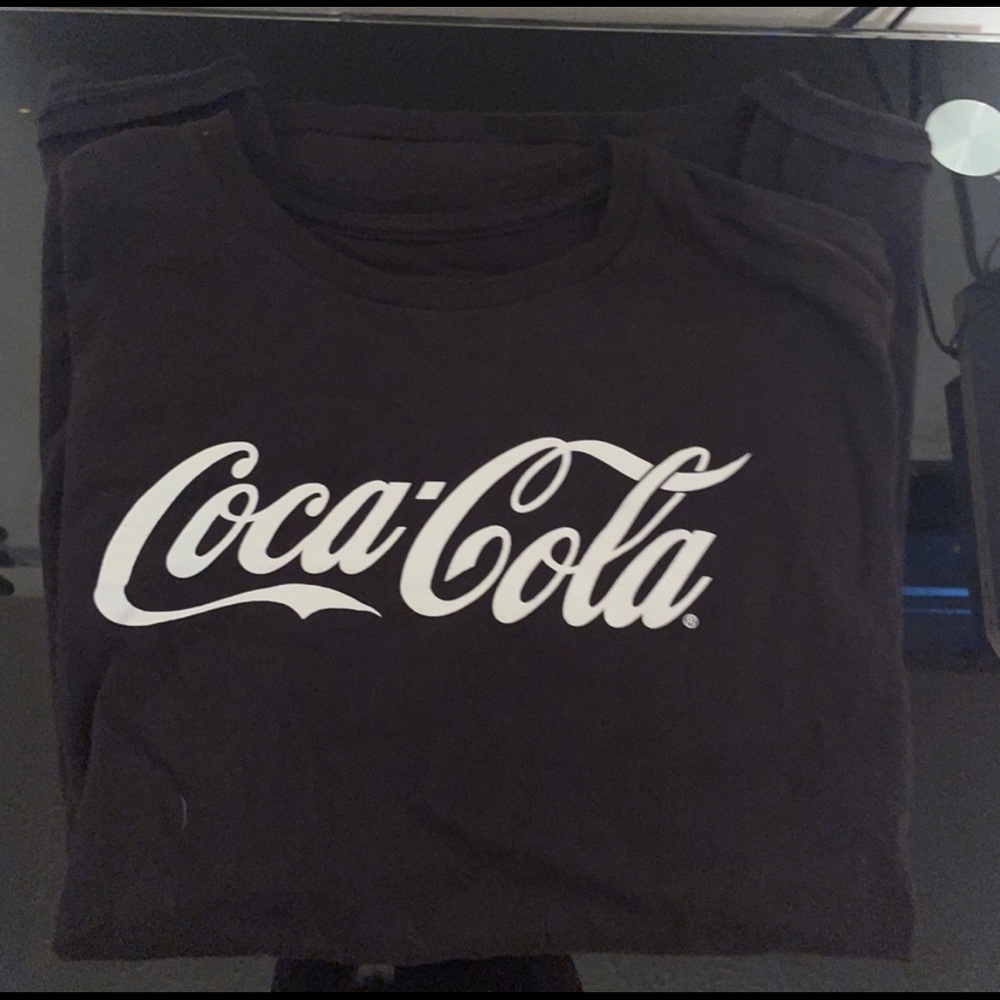 Coca-Cola shirt. -nathan